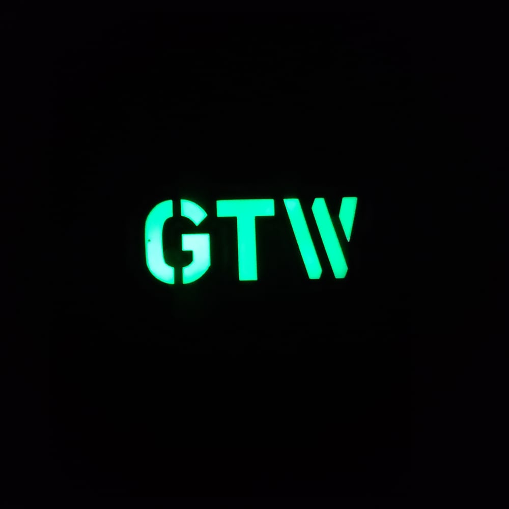 Image of GTW laser cut grayish patch, glow-in-the-dark 