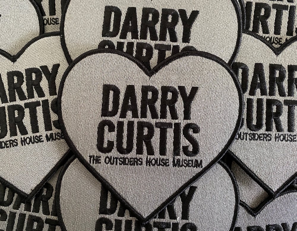 Image of The Outsiders House Museum "Darry Curtis" Heart Patch. 