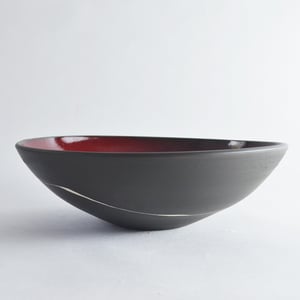 Image of black and red serving bowl