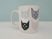 Three Eyed Cat mug