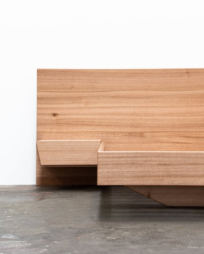 FLOATING BED WITH CLIPPED WING DRAWERS IN TASMANIAN OAK