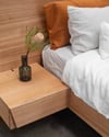 FLOATING BED WITH CLIPPED WING DRAWERS IN TASMANIAN OAK