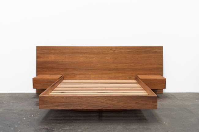 FLOATING BED WITH CLIPPED WING DRAWERS IN TASMANIAN BLACKWOOD