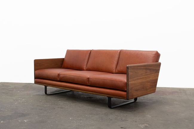 CLOVER COUCH IN TASMANIAN BLACKWOOD WITH BRAZIL LEATHER