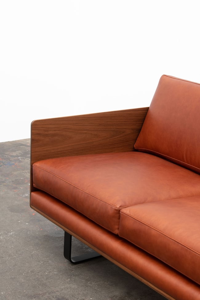 CLOVER COUCH IN TASMANIAN BLACKWOOD WITH BRAZIL LEATHER