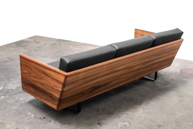 CLOVER COUCH IN TASMANIAN BLACKWOOD WITH  BLACK LEATHER