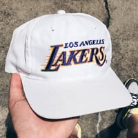 Image 1 of Original 90’s Sports Specialties “Script” Lakers Snapback Hat.