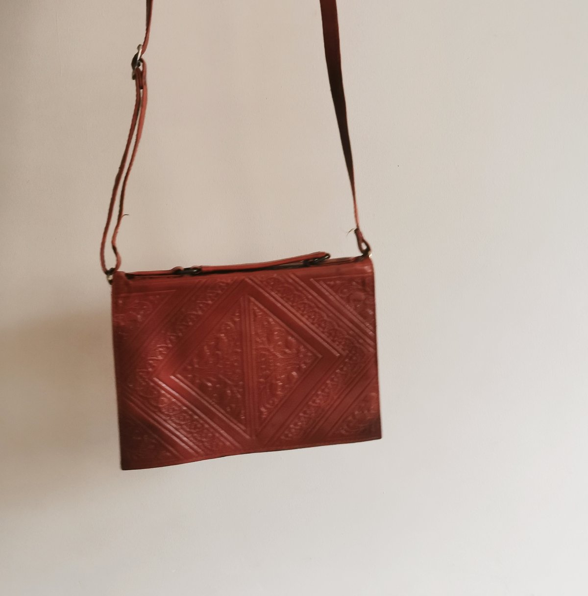 Image of red leather bag
