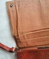 red leather bag