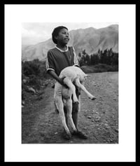 Image 1 of Boy and his lamb. Sacred Valley, Peru.  2006