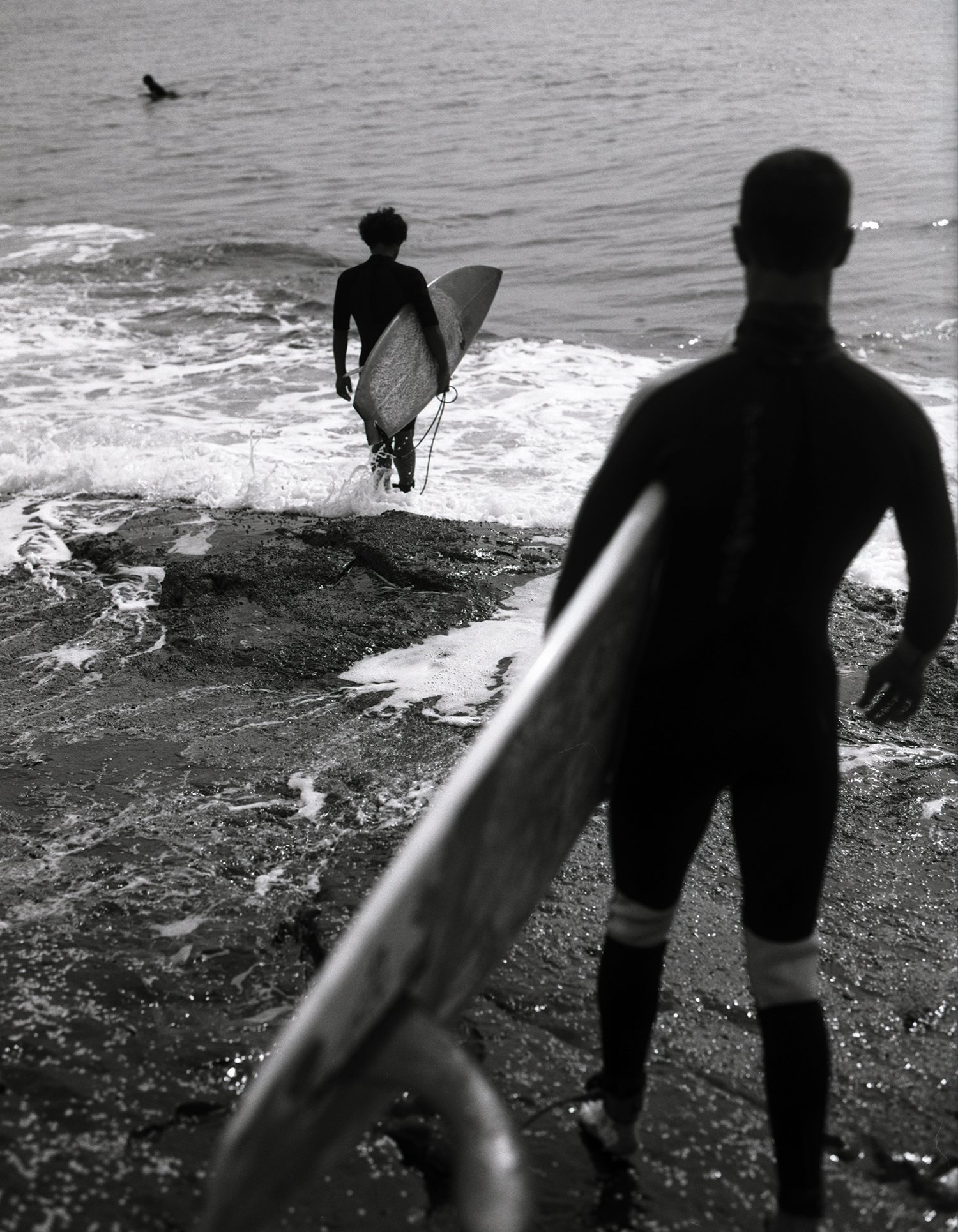 Image of One, Two, Three Surfers. Noosa, Australia. 2004