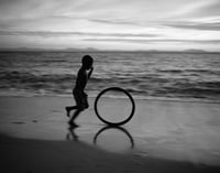 Image 2 of Boy Playing. Madagascar. 2007