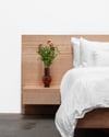 FLOATING BED WITH MITRED DRAWERS IN TASMANIAN OAK