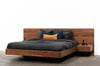 FLOATING BED WITH MITRED DRAWERS IN AMERICAN WALNUT