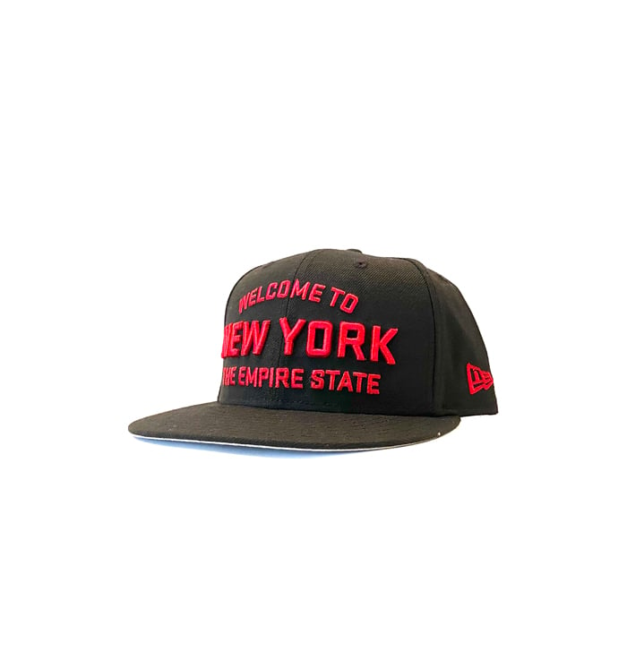 Image of 2520 X NEW ERA WELCOME TO NEW YORK THE EMPIRE STATE  9FIFTY SNAPBACK - BLACK/RADIANT RED