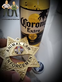 Image 1 of ANIMAL LAW ENFORCEMENT BOTTLE OPENER/KEYCHAIN 