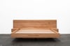 FLOATING BED WITH CLIPPED WING DRAWERS IN BLACKBUTT