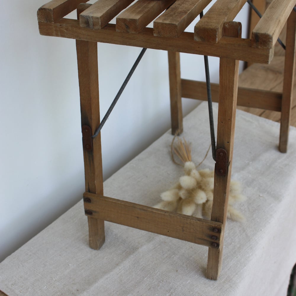 Image of Siège pliant ancien en bois.
