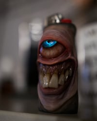 Image 24 of Faded Face Bic Lighter Sleeve