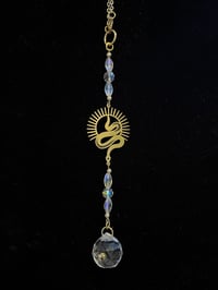SNAKE CHARMER CAR CHARM - gold