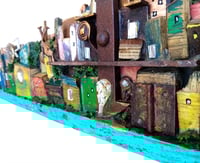 Image 2 of Panorama cittadino con Luna piena/Full moon lost and found city skyline