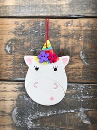 Image 1 of Buttons unicorn decoration