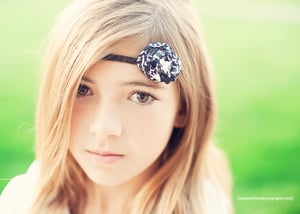 Image of Black and White on a thin headband