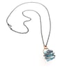 raw aquamarine necklace with coil setting