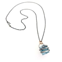 Image 2 of raw aquamarine necklace with coil setting