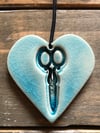 Teal scissors heart