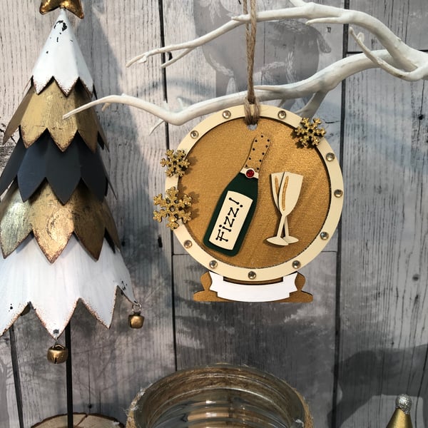 Image of Champers Snowglobe decoration