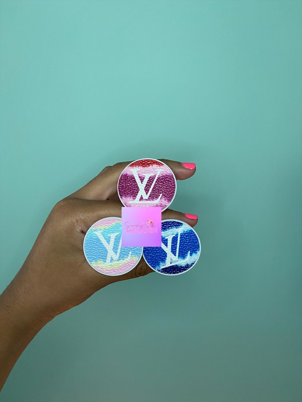 Image of designer pop sockets .