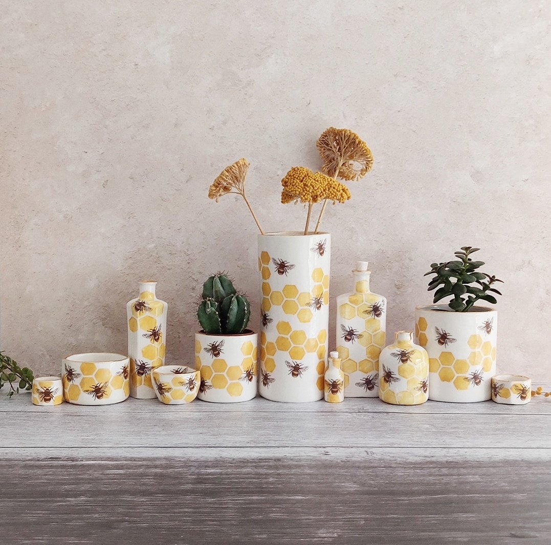 Tall porcelain hexagonal bee bottle