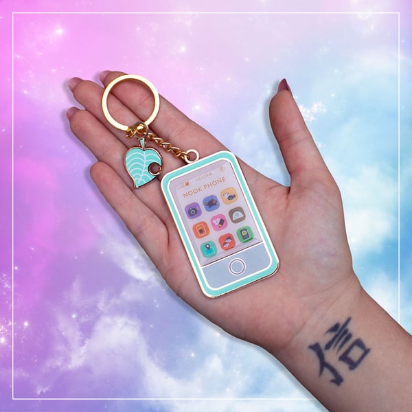Image of Animal Crossing New Horizons Nook Phone Hard Enamel Keychain