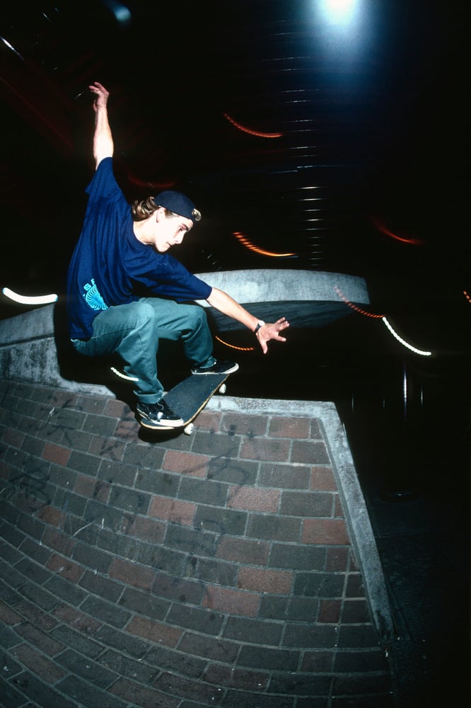John Cardiel, fakie lipslide China Banks, San Francisco 1991 by Tobin Yelland