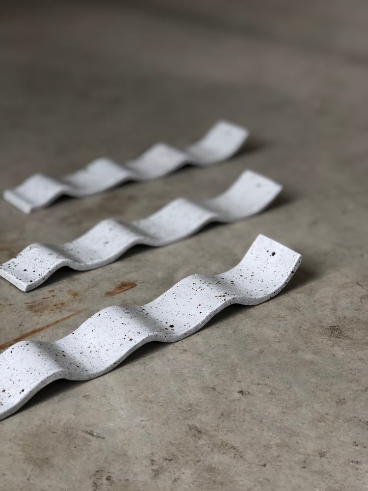 Image of incense holders in speckled frost