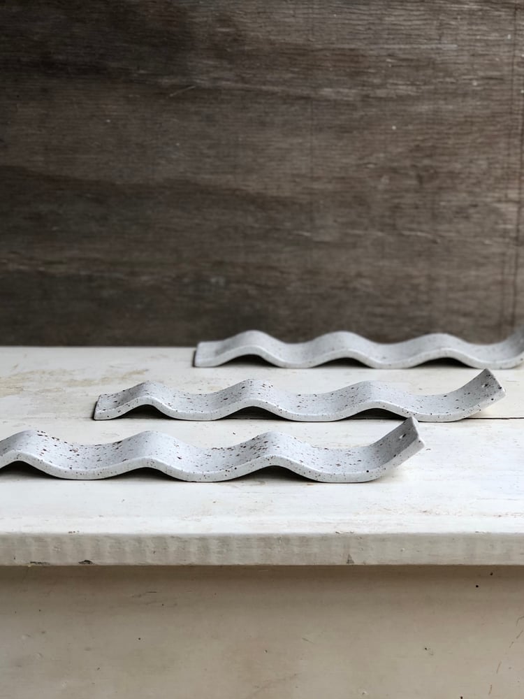 Image of incense holders in speckled frost