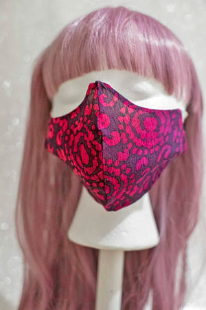 Image of dark rose pink tie dye . reversible mask