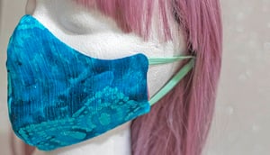 Image of blue tie dye . reversible mask