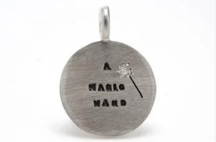 Image of Silver charms with a diamond (Well-Being, Unconditional Love, The Answer, The Sea, A Magic Wand)