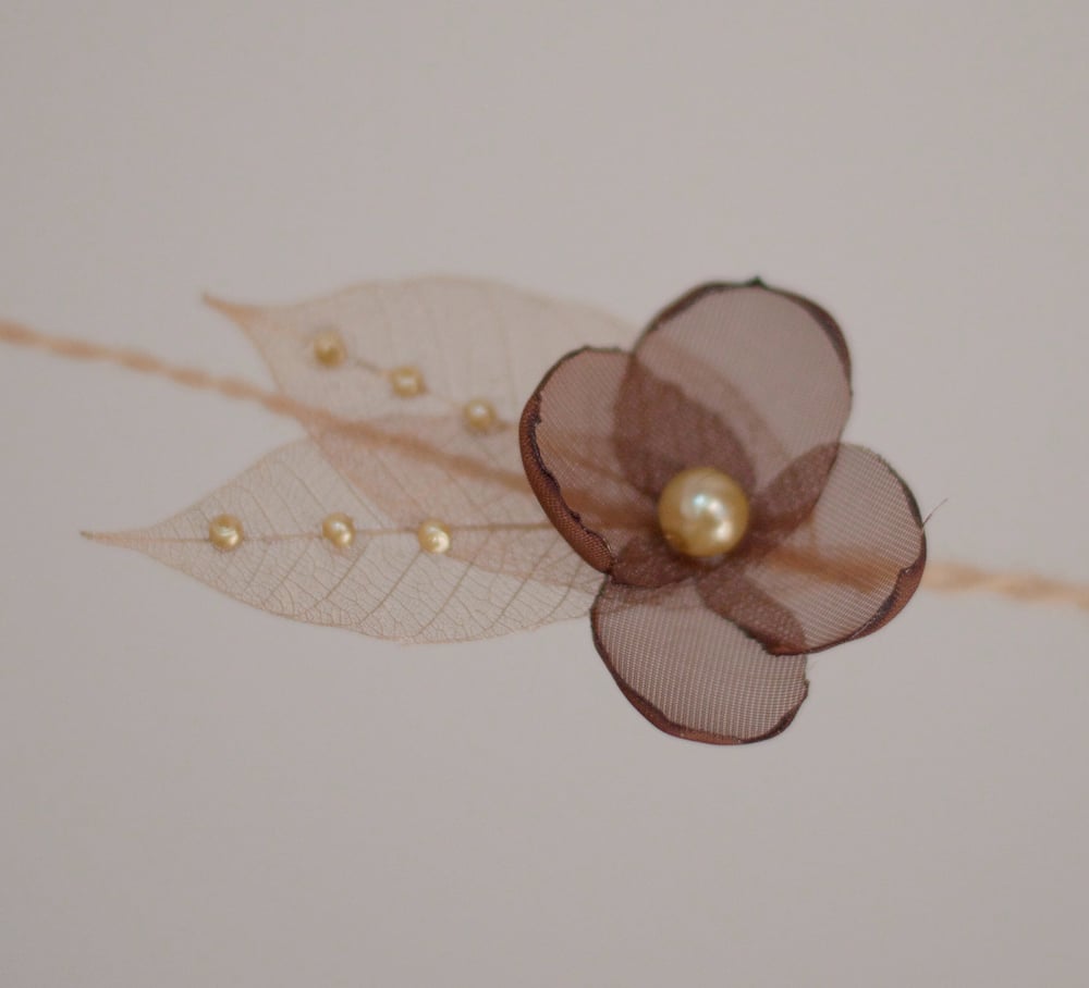 Image of Copper leaf tieback 