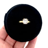 Image 2 of grey moissanite engagement ring in 18k gold