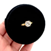 Image 4 of grey moissanite engagement ring in 18k gold