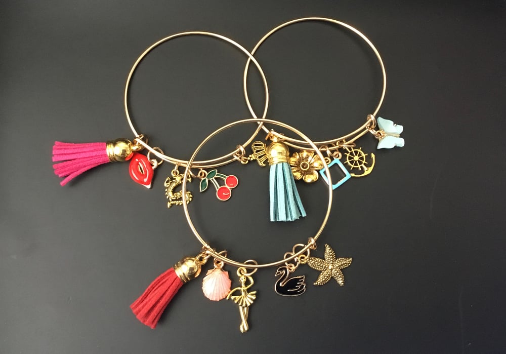 Image of Gold Charm Bracelet.