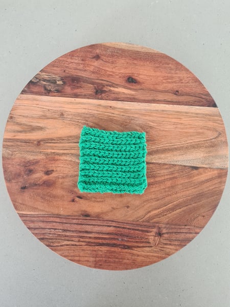 Image of Green Recycled Cotton Face Scrubbie. 