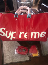 Red Supreme Travel Bag