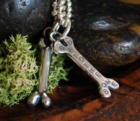 Image of Sterling Dog Bone charm with "Bad to the Bone" hand stamped on back