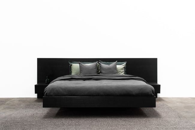 FLOATING BED WITH CLIPPED WING DRAWERS IN TORCHED TASMANIAN OAK