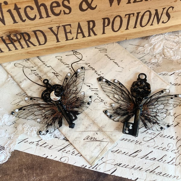 Image of Hocus pocus black faerie wing and key adornments