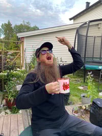 Image 1 of Neseblod Cup! Fenriz testing the cup.